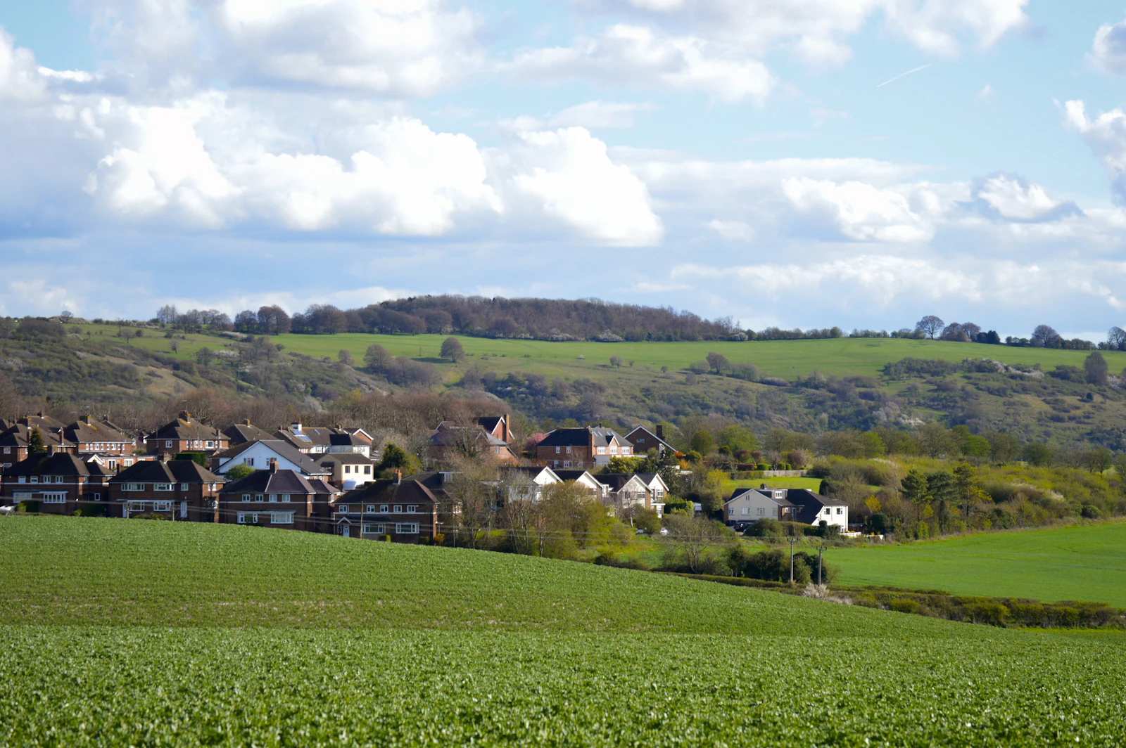 A small village set in green, rolling countryside