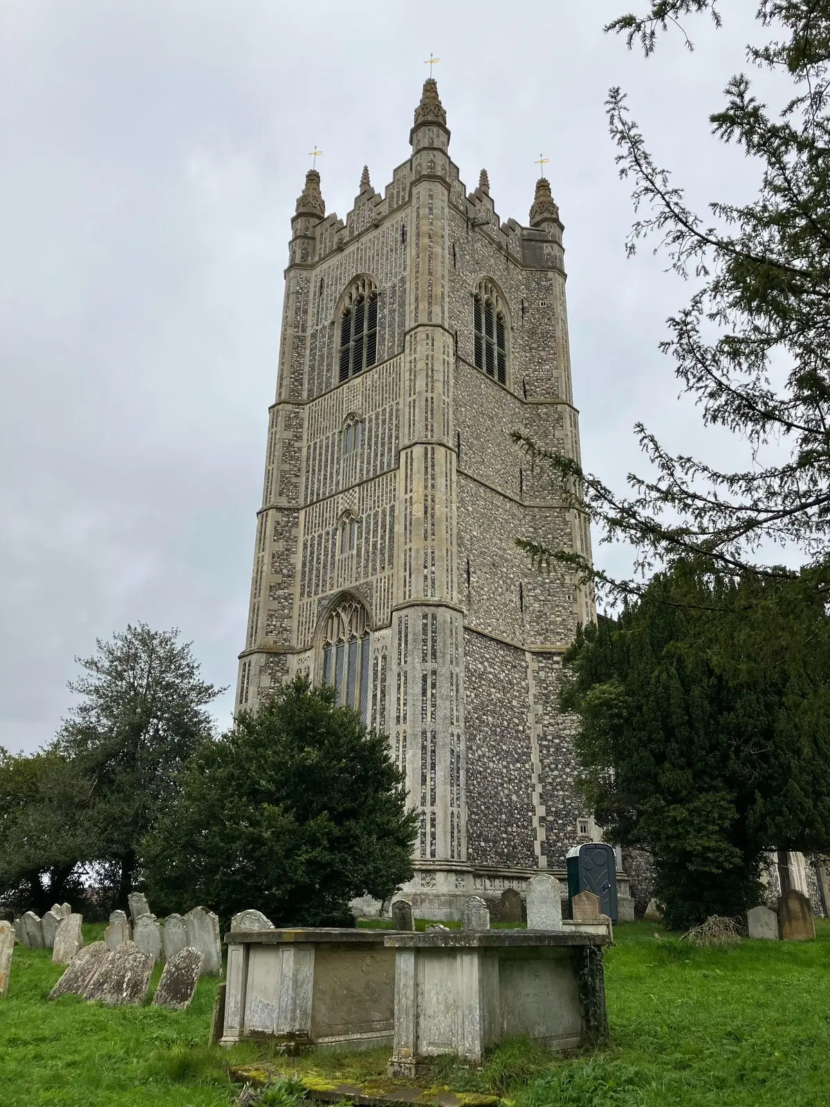 Historic church tower within a heritage setting